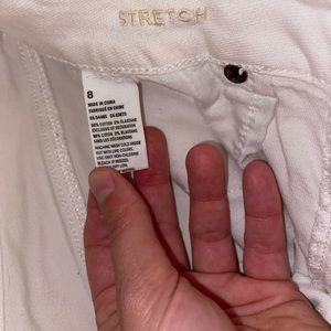 AE white cut off stretch jean shorts